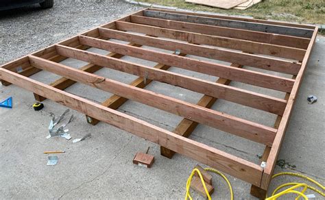 skid steer storage shed|using 4x4 for shed foundation.